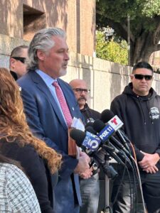 AIJ Communications client Mark Peacock at a November, 2022 press conference in Los Angeles.